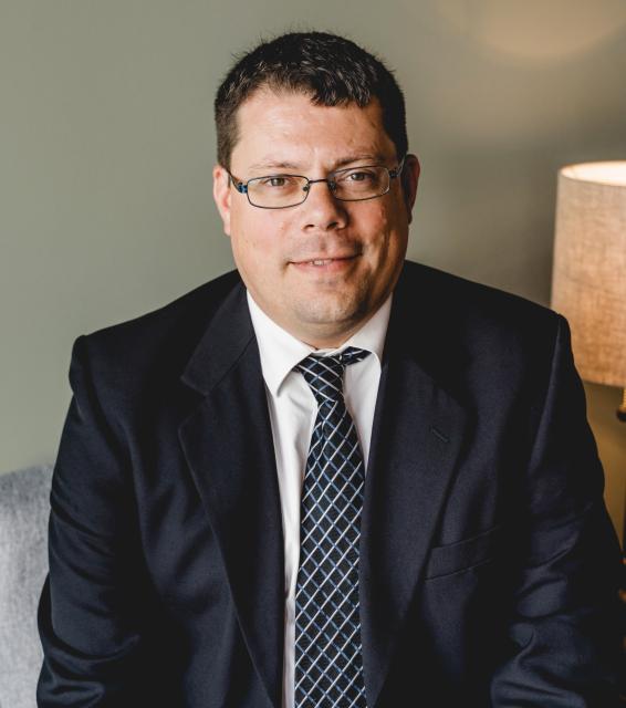 Podcast headshot for Decoding Agricultural Economics: Research with Dr. Aaron Smith
