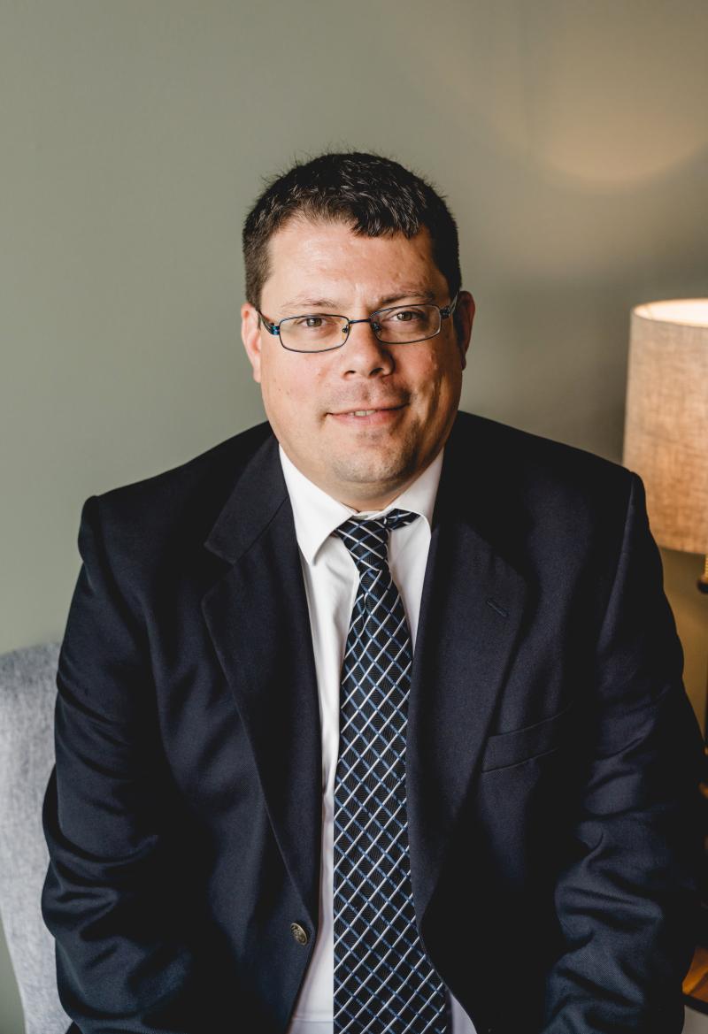 Podcast headshot for Decoding Agricultural Economics: Research with Dr. Aaron Smith